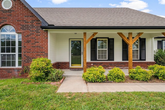 property entrance featuring a porch