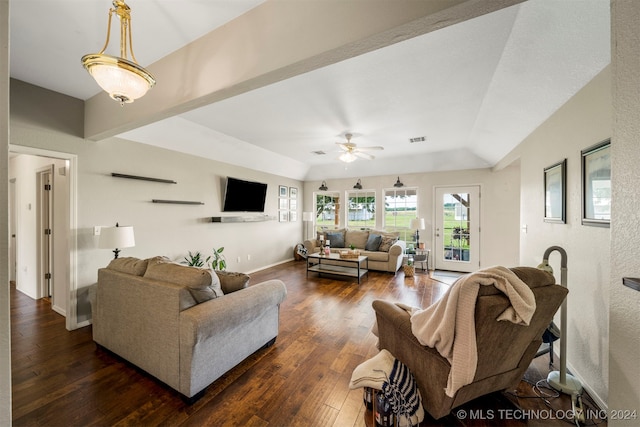 living room featuring ceiling fan and dark hardwood / wood-style flooring