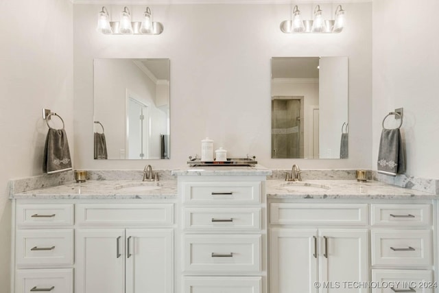 bathroom with vanity and crown molding