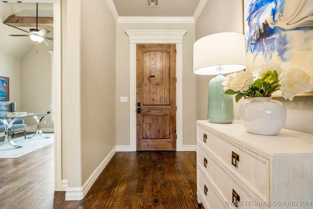 entrance foyer with beam ceiling, crown molding, ceiling fan, and dark wood-type flooring