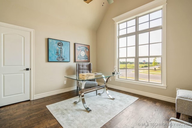 office area featuring ceiling fan, dark hardwood / wood-style floors, and lofted ceiling