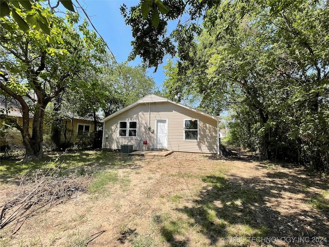 back of property featuring central air condition unit