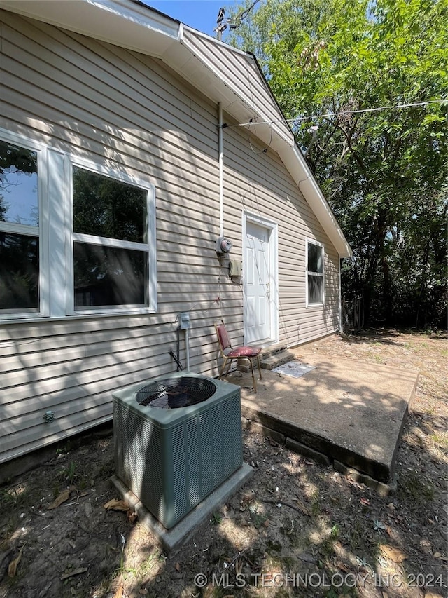 exterior space featuring a patio and central air condition unit