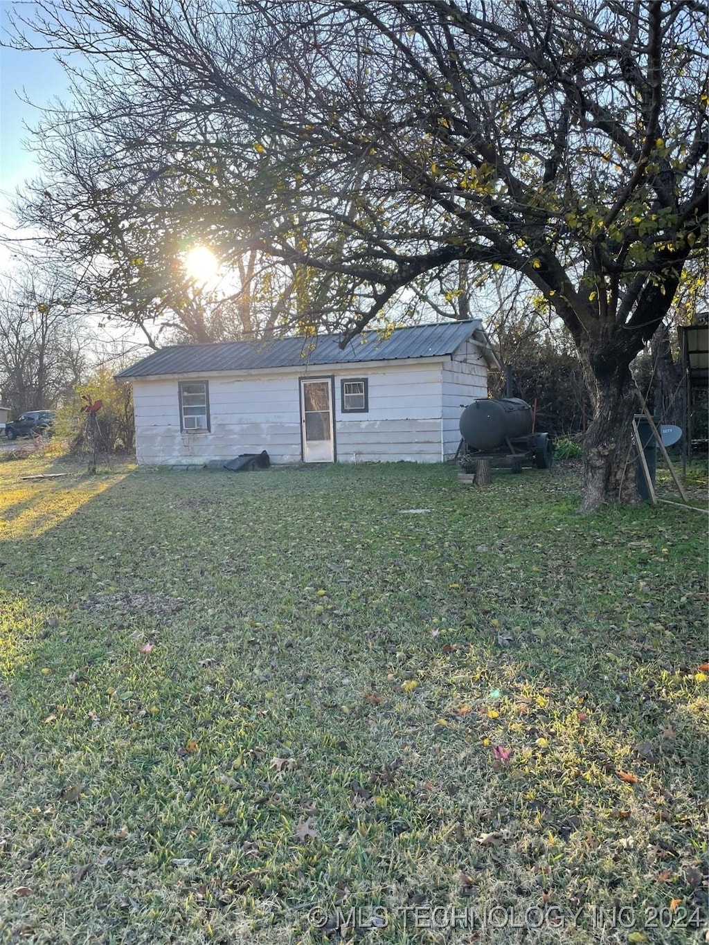 view of front of home with a front yard