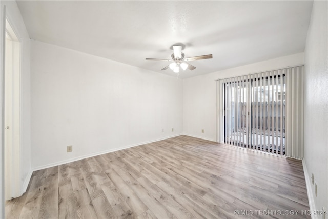 empty room with light hardwood / wood-style floors and ceiling fan