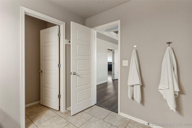 bathroom with hardwood / wood-style floors