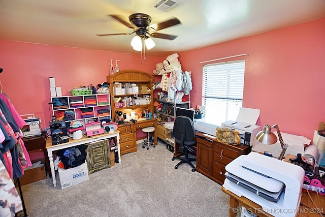 office area with ceiling fan and light carpet