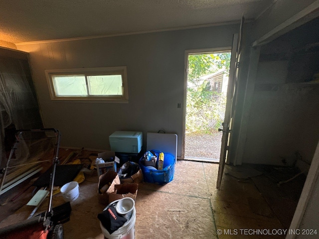 misc room with a textured ceiling