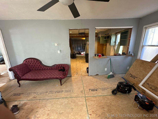 interior space featuring ceiling fan