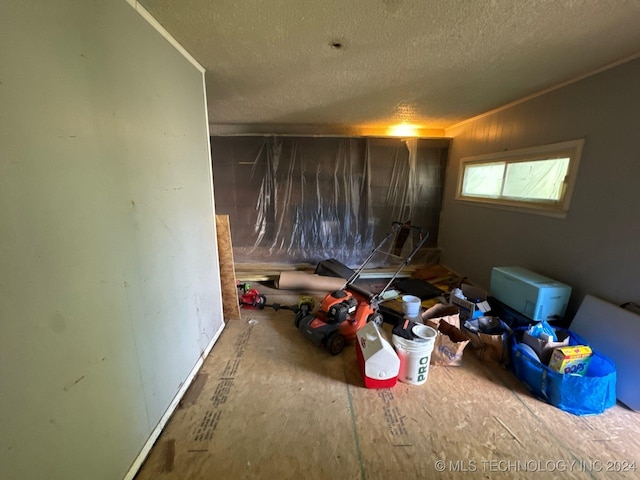 unfurnished bedroom featuring a textured ceiling