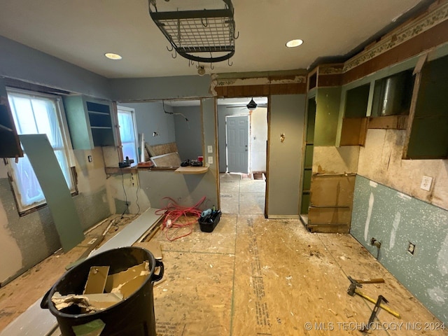 kitchen with green cabinetry