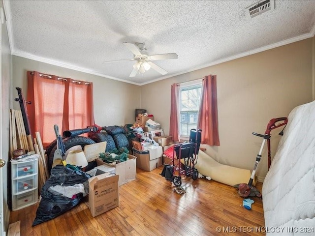 interior space with ceiling fan