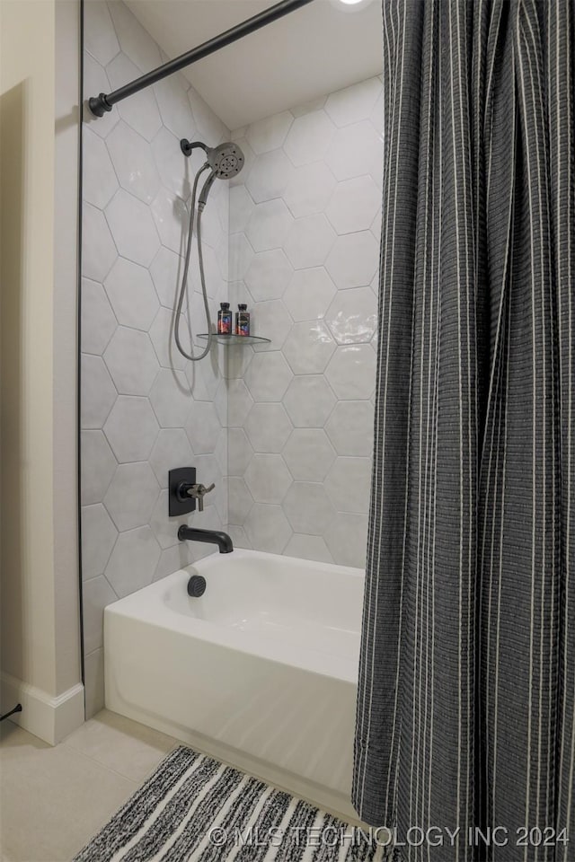 full bath with tile patterned flooring and shower / bath combination with curtain