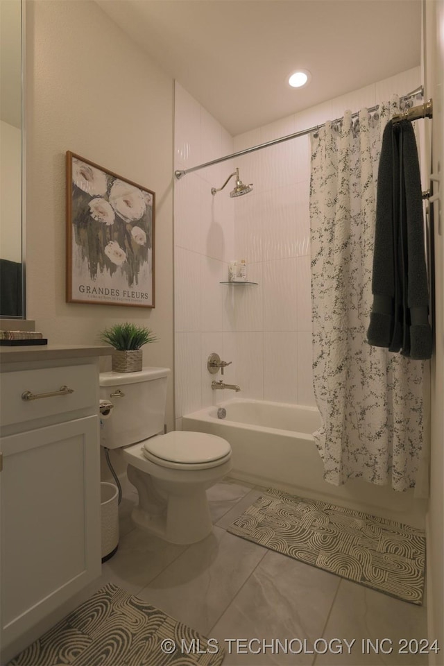 full bathroom with vanity, toilet, and shower / bath combo with shower curtain