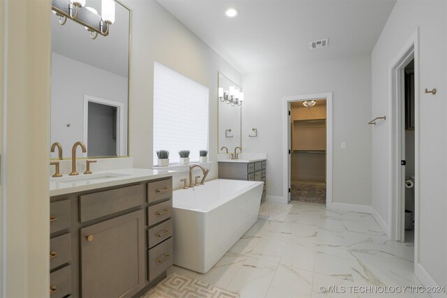 bathroom featuring vanity and a bathtub