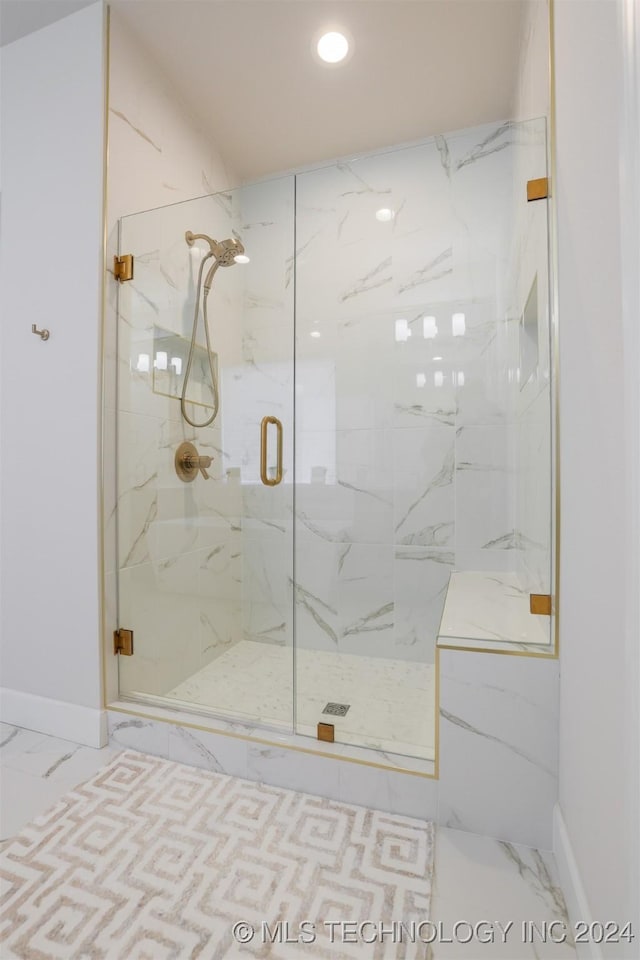 bathroom featuring a marble finish shower, recessed lighting, marble finish floor, and baseboards