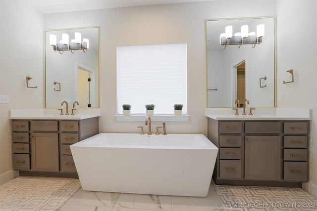 bathroom featuring a bathtub and vanity