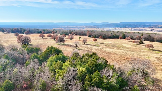 view of mountain feature with a rural view