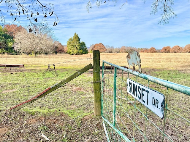 1 W County Road 1260, Stigler, OK 74462 - view of gate with a lawn, a rural view, and fence