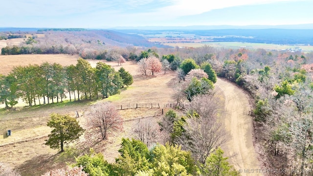 aerial view with a mountain view and a rural view