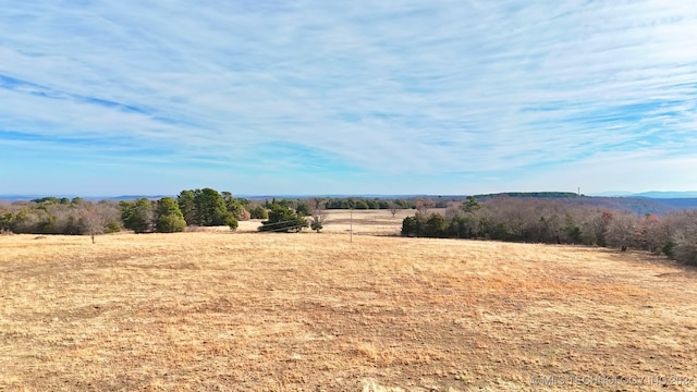 exterior space with a rural view