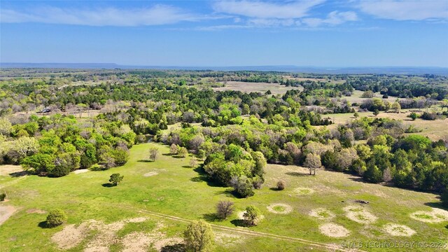 1 W County Road 1260, Stigler, OK 74462 - drone / aerial view featuring a forest view