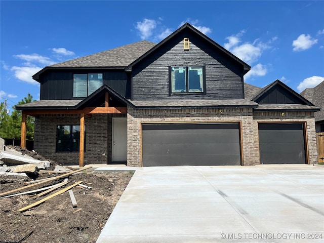 view of front of property with a garage