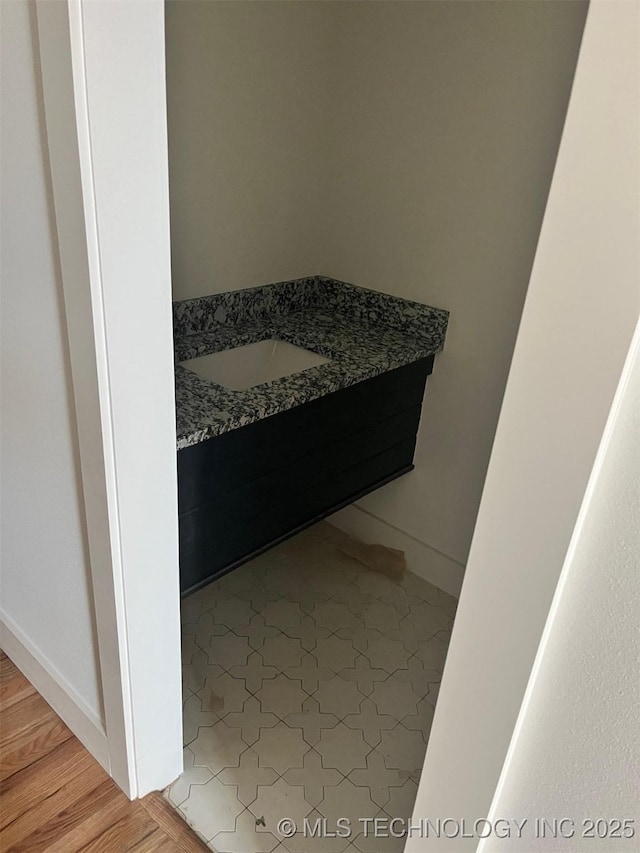 bathroom featuring hardwood / wood-style flooring