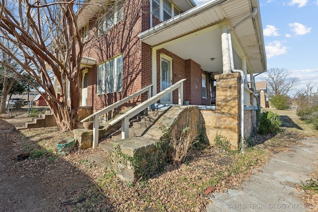 view of home's exterior with covered porch