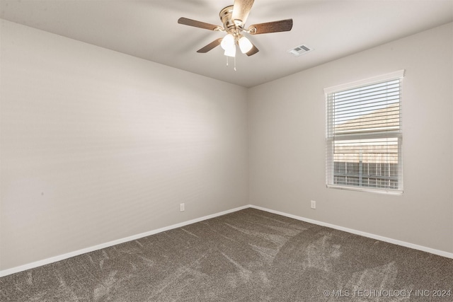 carpeted empty room with ceiling fan