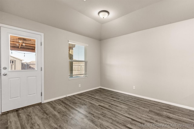 entrance foyer with dark wood-type flooring and lofted ceiling