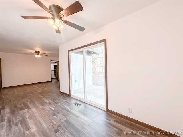 spare room with ceiling fan and hardwood / wood-style floors