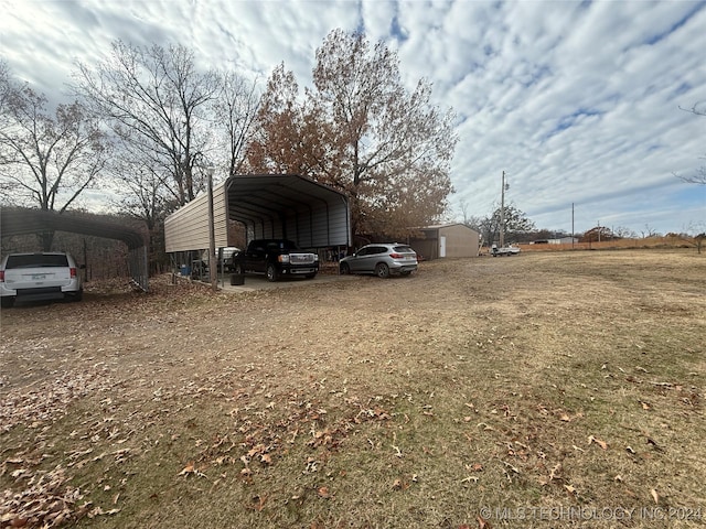 view of yard with a carport