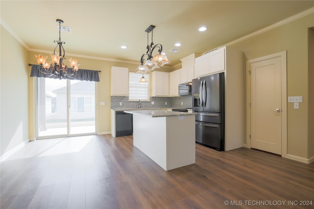 kitchen featuring decorative light fixtures, white cabinets, stainless steel fridge with ice dispenser, a center island, and dark hardwood / wood-style floors