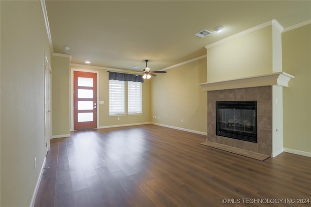 unfurnished living room with ceiling fan, dark hardwood / wood-style flooring, and ornamental molding