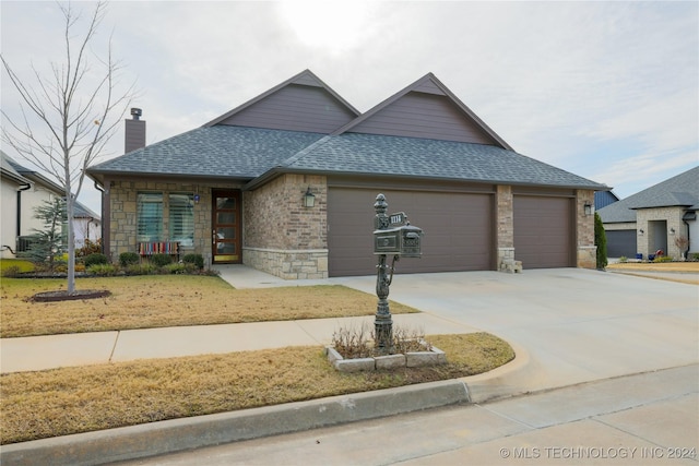 view of front of property featuring a garage