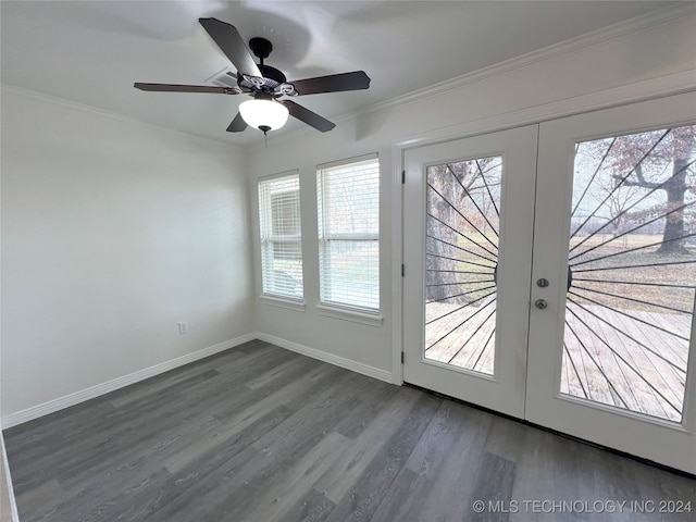 doorway with french doors, ornamental molding, dark wood-type flooring, and ceiling fan