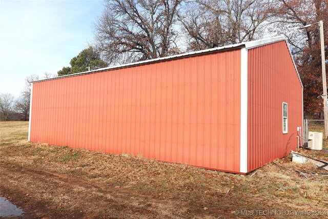 view of outdoor structure with central air condition unit