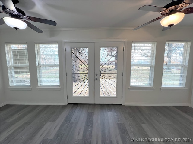 doorway featuring crown molding, french doors, and dark hardwood / wood-style floors