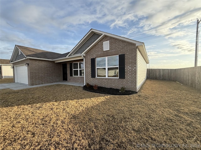 view of front of property featuring a garage