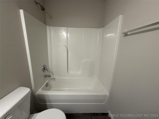 bathroom with toilet and shower / bathtub combination