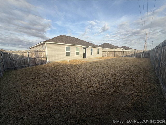 rear view of house with a patio area