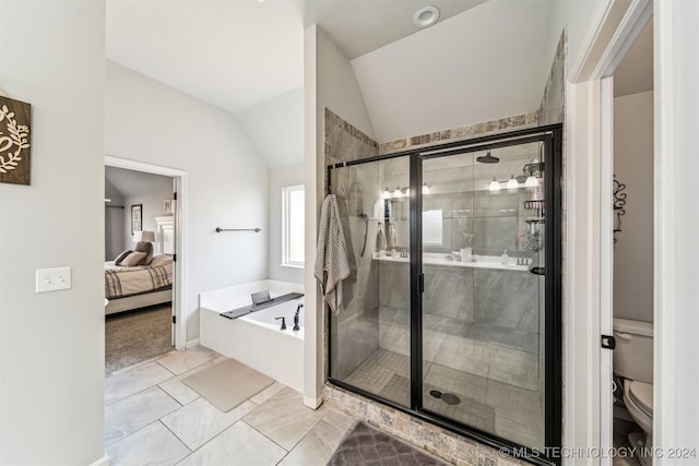 bathroom with tile patterned flooring, toilet, lofted ceiling, and independent shower and bath