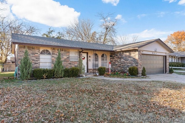 ranch-style home with a garage