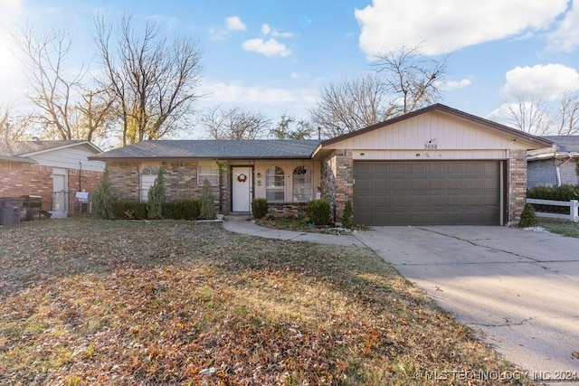 single story home with a garage