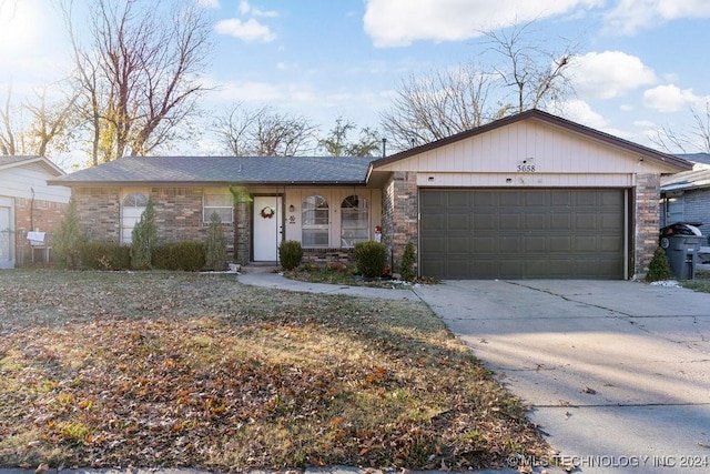 ranch-style house featuring a garage