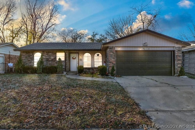 single story home with a garage