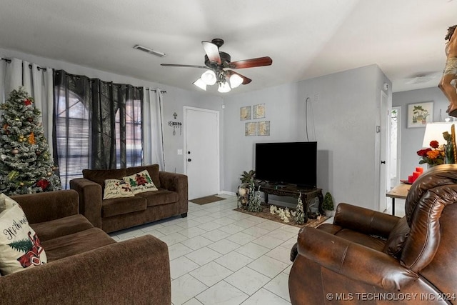 living room featuring ceiling fan