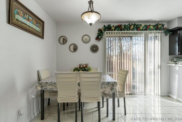 view of tiled dining room