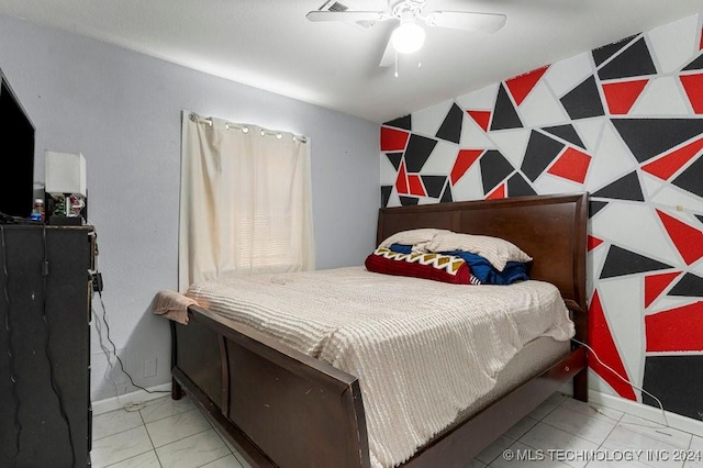 bedroom featuring ceiling fan